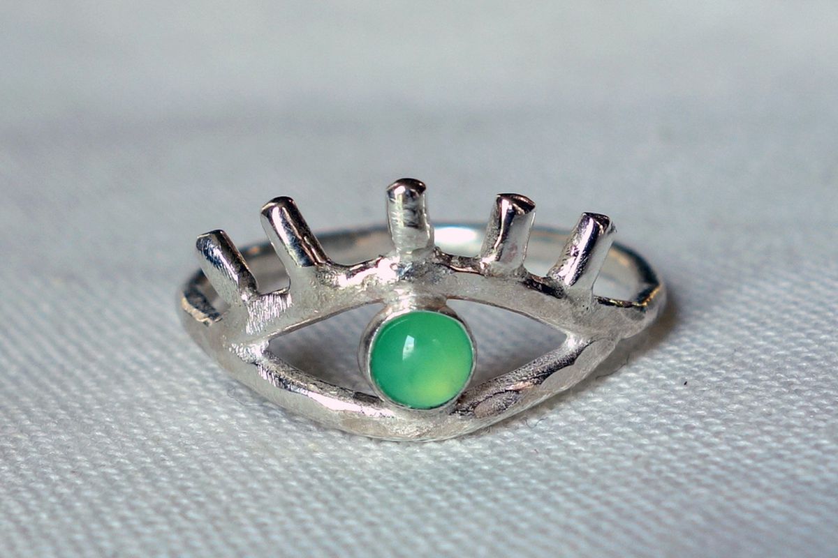 Green Eye Ring with Eyelashes, <a href="http://www.rachelpfeffer.com/product/green-eye-ring-with-eyelashes">$112</a>