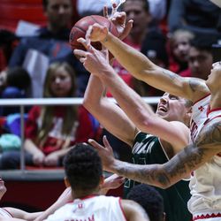 Utah Valley Wolverines forward Isaac Neilson (22) snags a rebound during the game against the Utah Utes at the Huntsman Center in Salt Lake City on Tuesday, Dec. 6, 2016.
