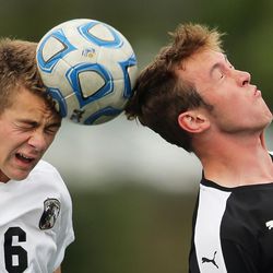 Lone Peak's Adam Canfield and Viewmont's Preston Pitt head the ball during play in 5A semifinal soccer action at Woods Cross Tuesday, May 24, 2016.
