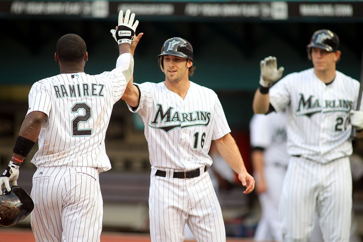 MIAMI GARDENS, FL - JULY 08:  Hanley Ramirez #2 of the Florida Marlins celebrates a home run with teammate Bryan Petersen #16 at Sun Life Stadium on July 8, 2011 in Miami Gardens, Florida.  (Photo by Marc Serota/Getty Images)