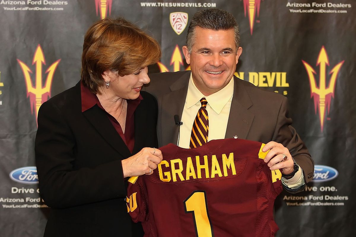 Todd Graham is introduced as ASU's new football head coach with VP of Athletics Lisa Love beside him.