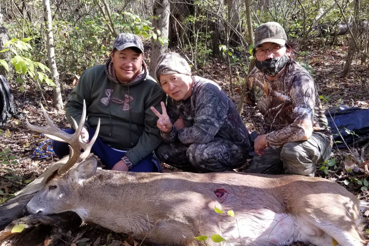 It was a family affair for Bruce Vang’s “old guy” buck. Photo provided
