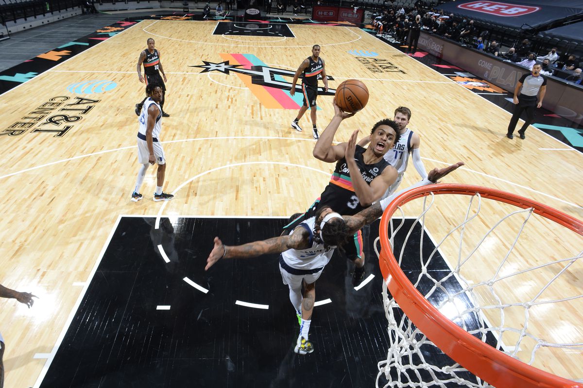 Keldon Johnson #3 of the San Antonio Spurs drives to the basket against the Dallas Mavericks on January 22, 2021 at the AT&amp;T Center in San Antonio, Texas.&nbsp;