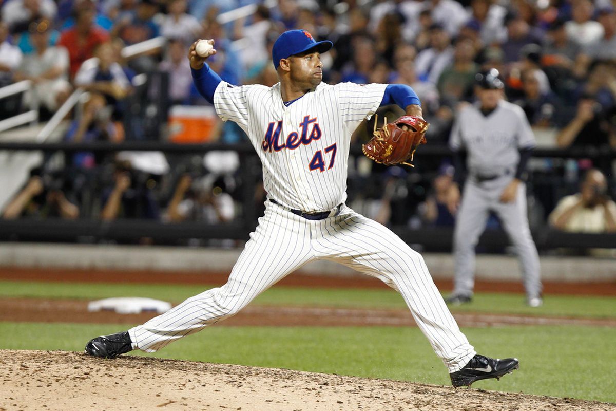 June 24, 2012; Flushing, NY, USA; New York Mets relief pitcher Miguel Batista (47) pitches against the New York Yankees during the eighth inning at Citi Field. Mandatory Credit: Debby Wong-US PRESSWIRE