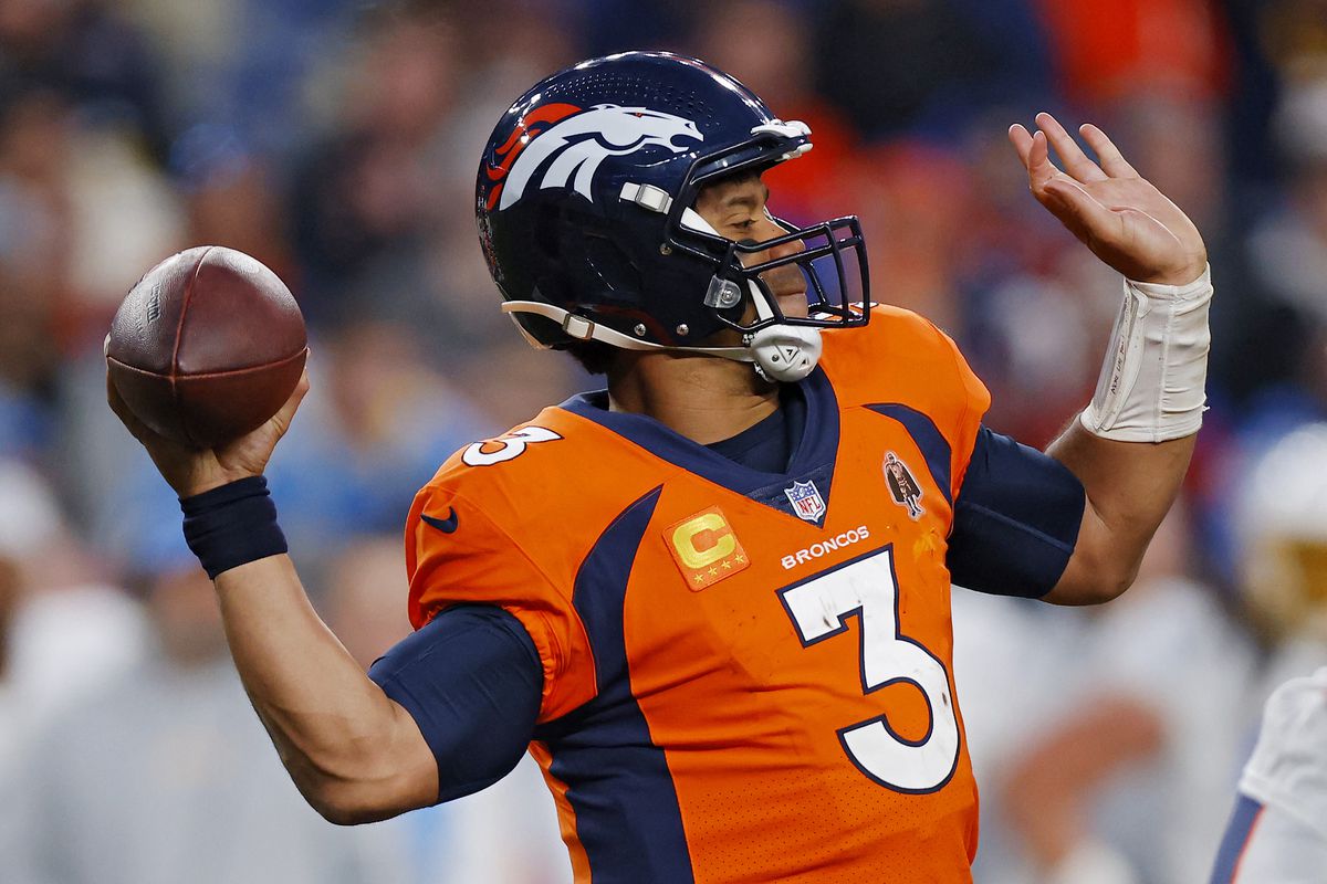 Russell Wilson #3 of the Denver Broncos attempts a pass during the fourth quarter against the Los Angeles Chargers at Empower Field At Mile High on January 08, 2023 in Denver, Colorado.