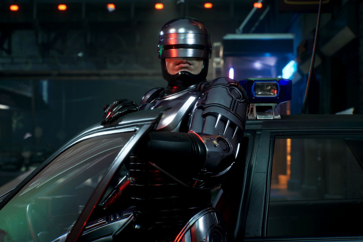 RoboCop steps out of his police car in a nighttime screenshot from RoboCop: Rogue City