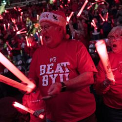 Marv Parkinson and Jo Divver cheer before the start of an NCAA womens college basketball game in Salt Lake City on Saturday, Dec. 10, 2016. Utah defeated rival Brigham Young 77-60.