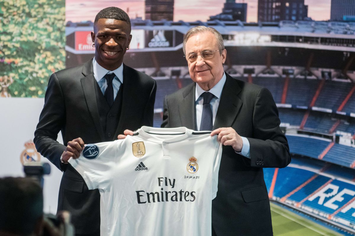 Real Madrid’s new Brazilian forward Vinicius and president...