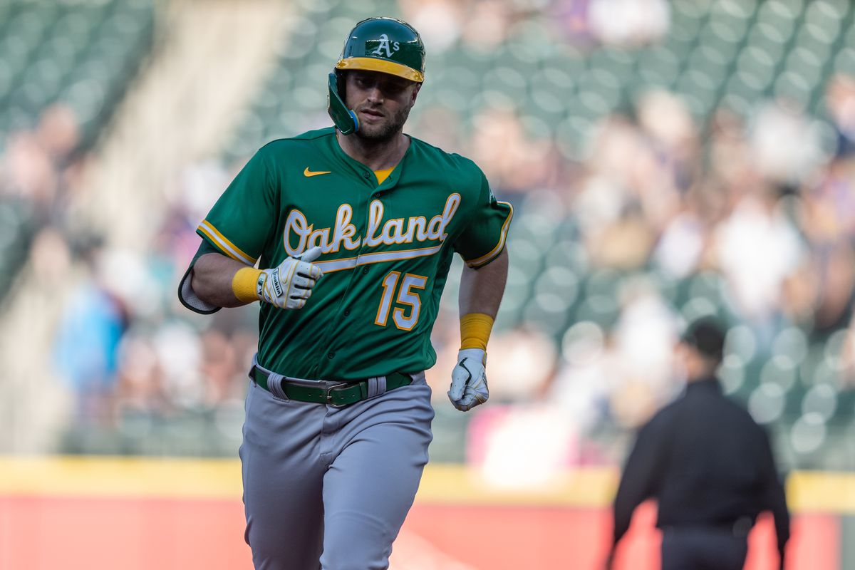 Seth Brown of the Oakland Athletics rounds the bases after hitting a home run during a game against the Seattle Mariners at T-Mobile Park on May 25, 2023 in Seattle, Washington. The Mariners won 3-2.