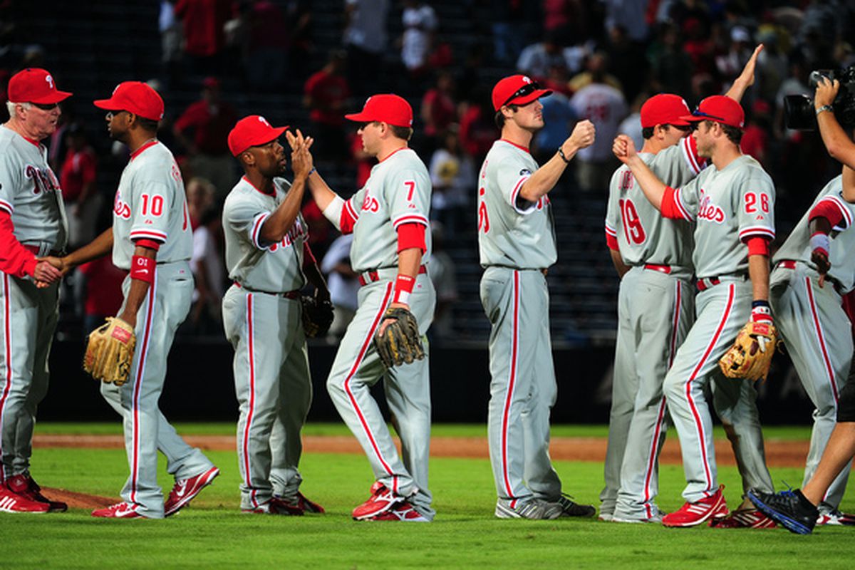 ATLANTA - OCTOBER 2: Members of the Philadelphia Phillies celebrate after the game against the Atlanta Braves at Turner Field on October 2 2010 in Atlanta Georgia.  (Photo by Scott Cunningham/Getty Images)
