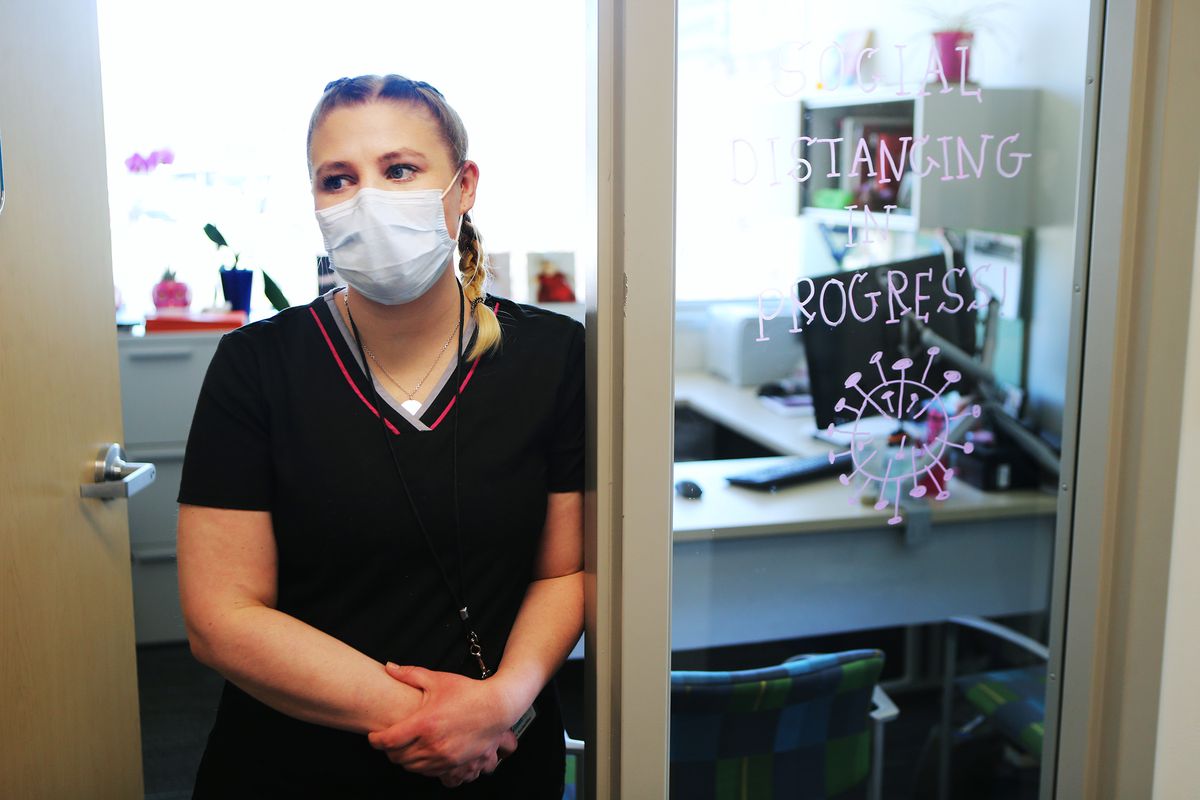 Tara Brunatti, a nursing supervisor with the Salt Lake County Health Department, talks about pulling workers from other public health divisions to help trace the contacts of people infected with COVID-19 during an interview in Salt Lake City on Friday, April 10, 2020.