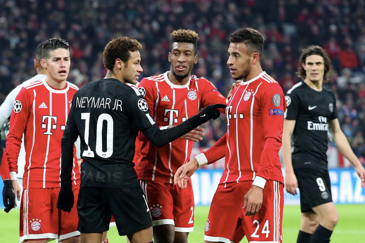 Neymar Jr of Paris Saint-Germain react with Corentin Tolisso and Kingsley Coman of Bayern Muenchen during the UEFA Champions League group B match between Bayern Muenchen and Paris Saint-Germain (PSG) at Allianz Arena on December 5, 2017 in Munich, Germany. 
