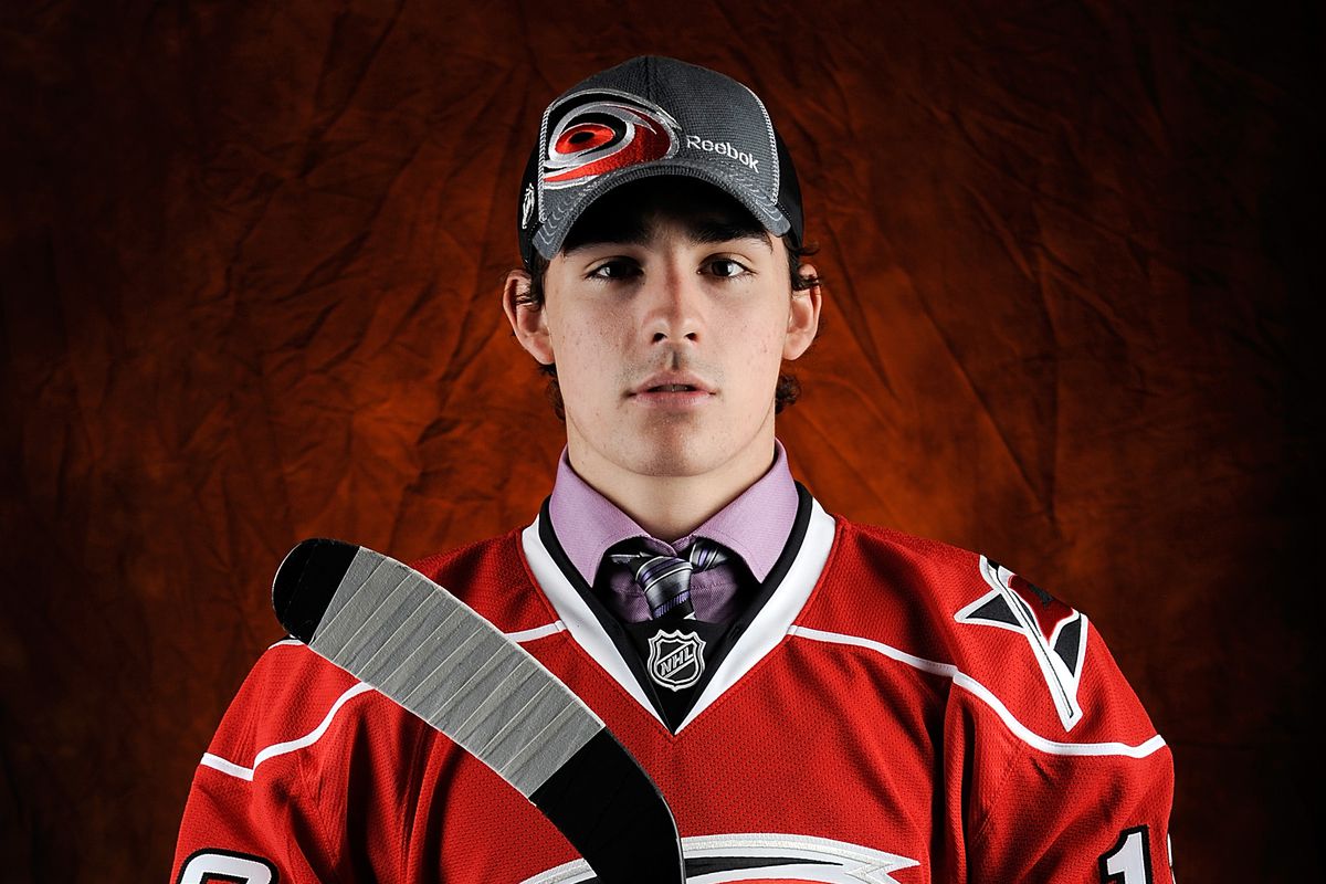 Trevor Carrick, after being selected 115th overall by the Hurricanes in 2012