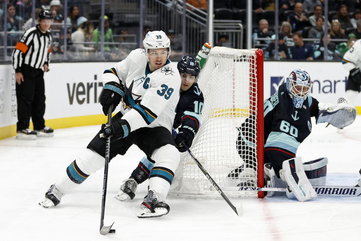 Logan Couture #39 of the San Jose Sharks controls the puck against the Seattle Kraken during the third period at Climate Pledge Arena on April 29, 2022 in Seattle, Washington.