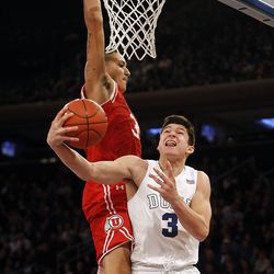 Duke Blue Devils guard Grayson Allen (3) tries to go under Utah Utes forward Kyle Kuzma, left, for a layup during the first half of the Ameritas Insurance Classic at Madison Square Garden in New York City, Saturday, Dec. 19, 2015.