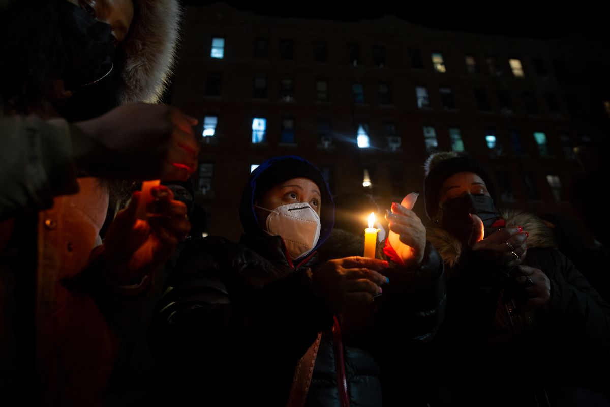 The vigil for victims of the Twin Parks Towers fire. Jan. 11, 2022.