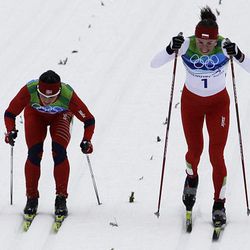 Poland's Justyna Kowalczyk, right, and Norway's Marit Bjoergen race side by side during the Women's 30k mass start classic race at the Vancouver 2010 Olympics in Whistler, British Columbia, Canada, Saturda. Kowalczyk won gold, Bjoergen silver. 