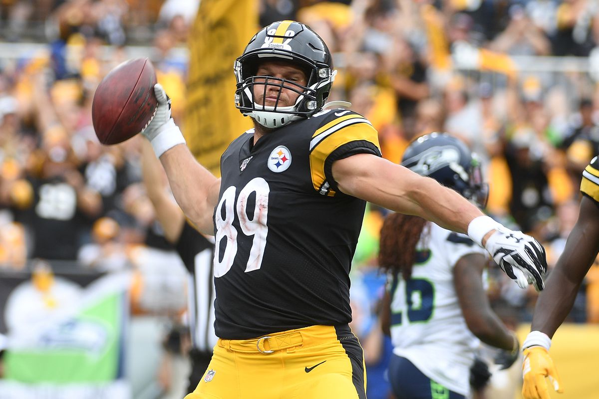 Vance McDonald #89 of the Pittsburgh Steelers spikes the ball after a three-yard touchdown reception in the third quarter during the game against the Seattle Seahawks at Heinz Field on September 15, 2019 in Pittsburgh, Pennsylvania.