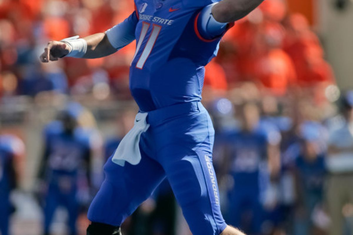 BOISE, ID - OCTOBER 01:  Kellen Moore #11 of the Boise State Broncos passes against the Nevada Wolf Pack at Bronco Stadium on October 1, 2011 in Boise, Idaho.  (Photo by Otto Kitsinger III/Getty Images)
