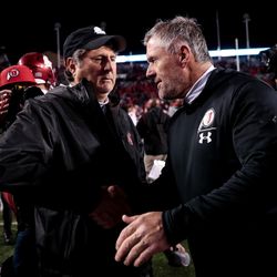 Washington State Cougars head coach Mike Leach and Utah Utes head coach Kyle Whittingham shake hands after Utah’s 38-13 win at Rice-Eccles Stadium in Salt Lake City on Saturday, Sept. 28, 2019.
