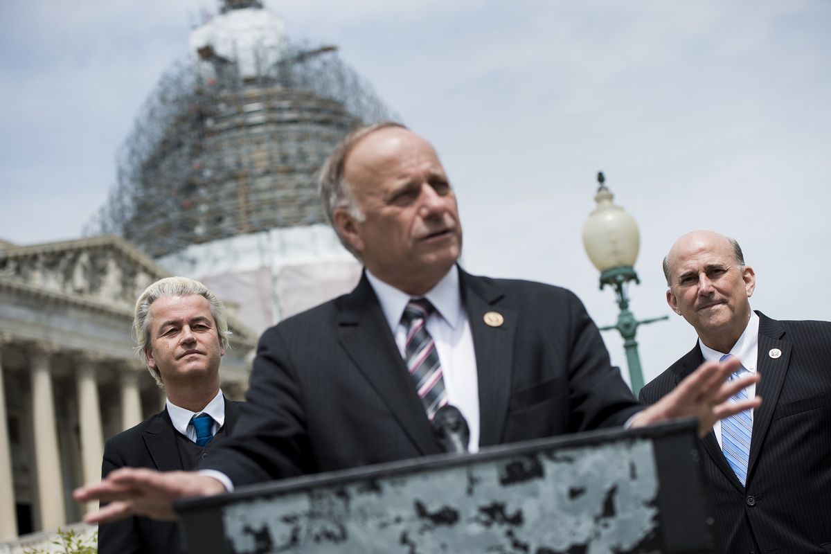 Dutch Member of Parliament Geert Wilders (L) and Rep. Louie Gohmert (R) R-TX listen while Rep. Steve King (R-IA) speaks during a press conference April 30, 2015 in Washington, DC. 