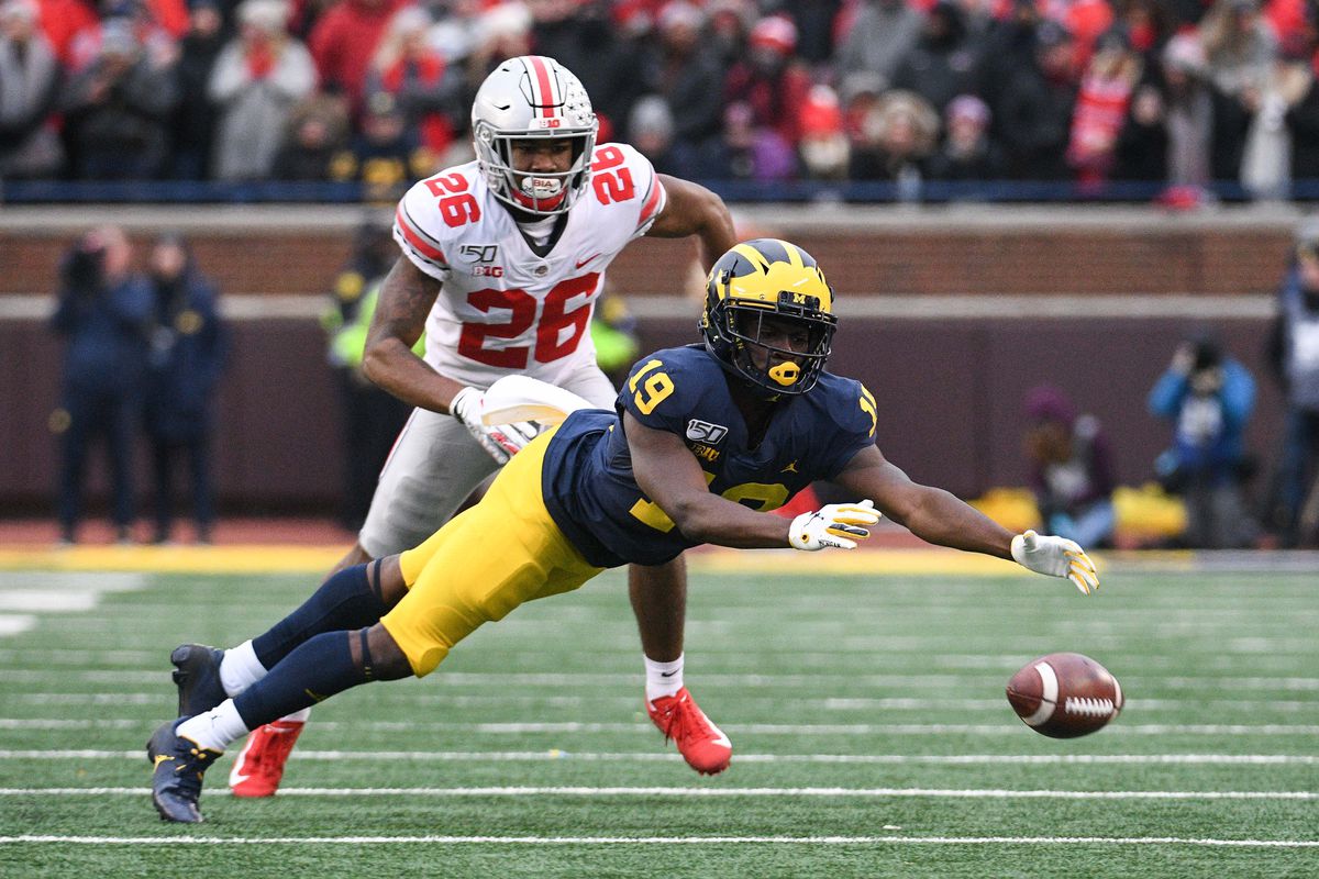 Michigan Wolverines wide receiver Mike Sainristil is unable to complete a pass as Ohio State Buckeyes cornerback Cameron Brown applies pressure during the second half at Michigan Stadium.