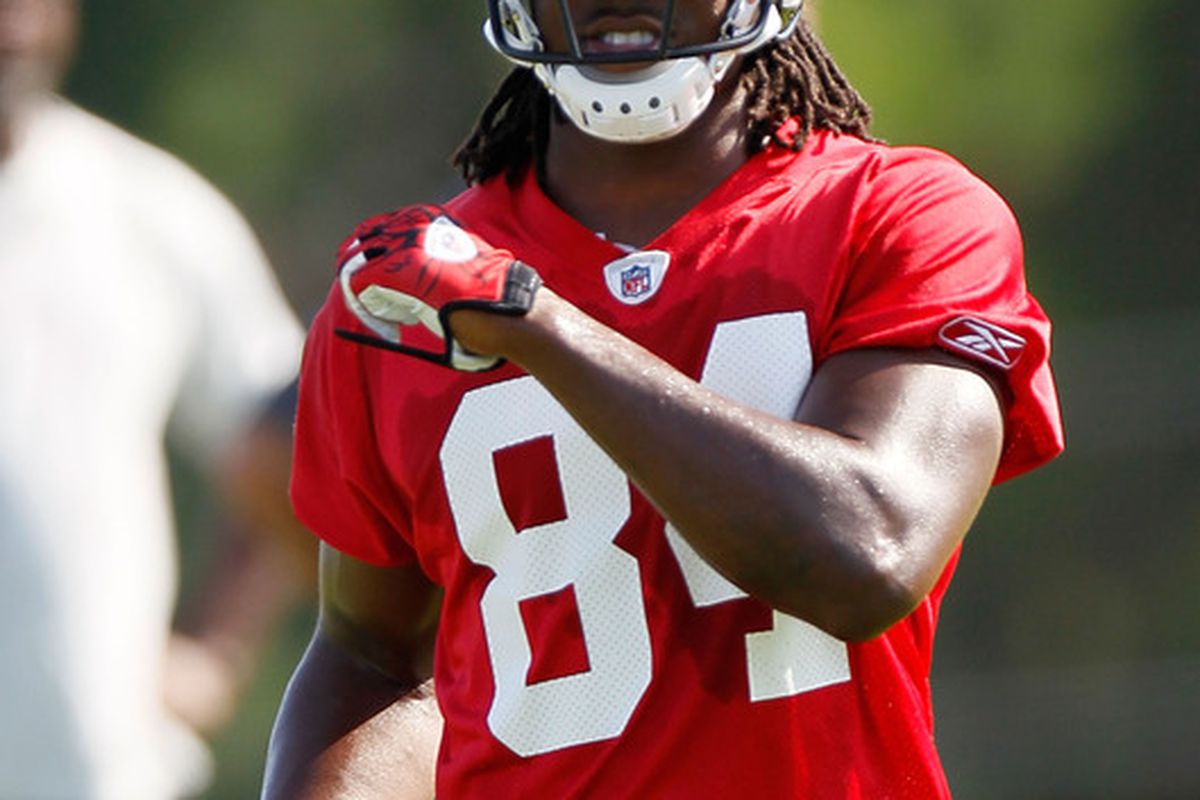 FLOWERY BRANCH GA - JULY 30:  Roddy White #84 of the Atlanta Falcons runs drills during opening day of training camp on July 30 2010 at the Falcons Training Complex in Flowery Branch Georgia.  (Photo by Kevin C. Cox/Getty Images)
