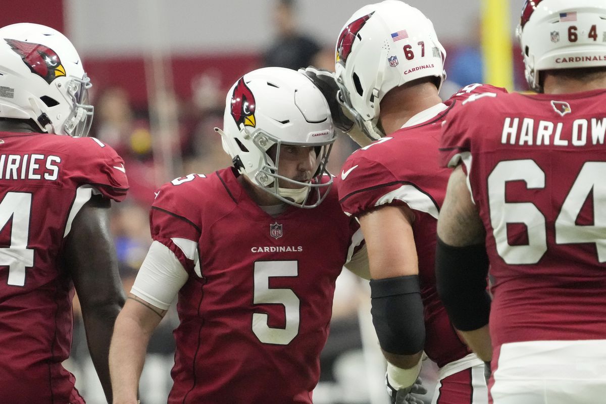 Arizona Cardinals place kicker Matt Prater (5) is congratulated by guard Justin Pugh (67) after a filed goal against the Los Angeles Rams during the third quarter at State Farm Stadium.