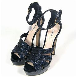 <a href="http://www.ebay.com/itm/ws/eBayISAPI.dll?ViewItem&item=221075412278#ht_2489wt_1179">Miu Miu Glitter Heels</a>. Current Bid: $102.50