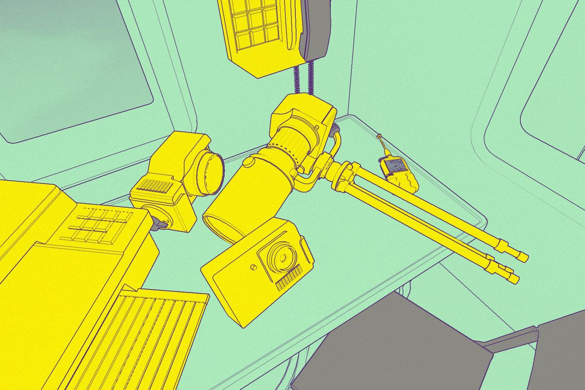 Screenshot from Nuts. The world is teal, and the objects — like a camera — are rendered in yellow.