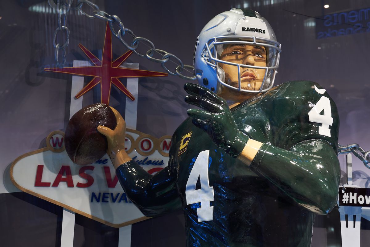 A display with a chocolate replica of a quarterback