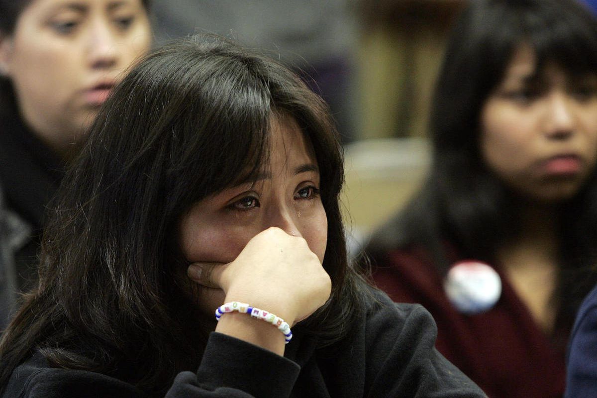 Undocumented UCLA student Leslie Perez, 22, weeps while watching a televised debate of the Dream Act in the Senate at the UCLA Downtown Labor Center in Los Angeles, Saturday, Dec. 18, 2010. Perez is an undocumented student at UCLA. The Dream Act would giv