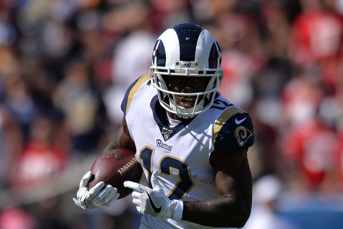 Los Angeles Rams wide receiver Brandin Cooks runs with the ball during the first half against the San Francisco 49ers at Los Angeles Memorial Coliseum.