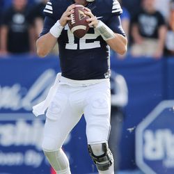 Brigham Young Cougars quarterback Tanner Mangum (12) throws against the Southern Utah Thunderbirds  in Provo on Saturday, Nov. 12, 2016.