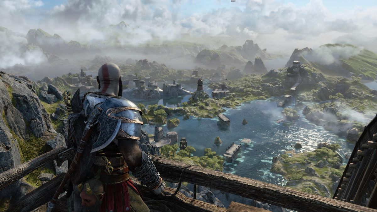 Kratos stands on a vista and looks out at the Bay of Bounty in God of War Ragnarok
