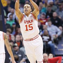 Utah Utes guard Lorenzo Bonam (15) launches a long shot at the half during the NCAA basketball tournament in Denver Thursday, March 17, 2016. Utah won 80-69. 