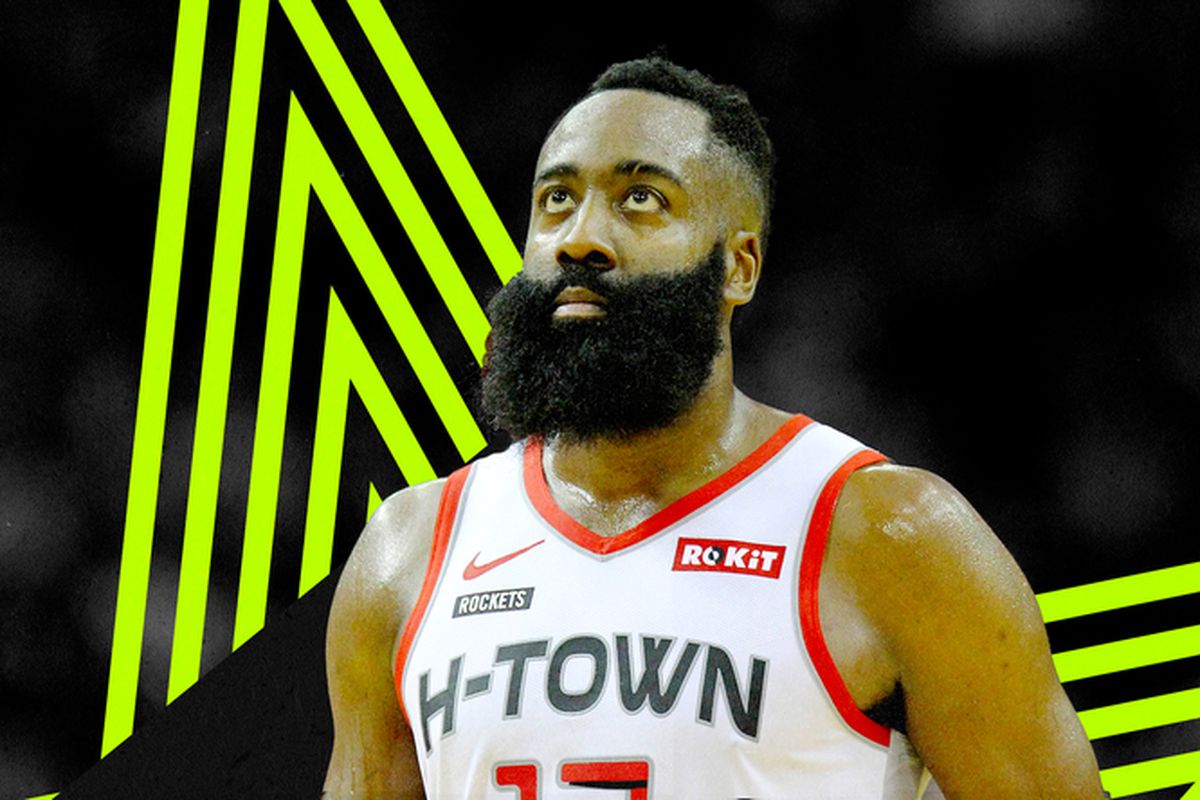James Harden stares on the court for the Rockets.