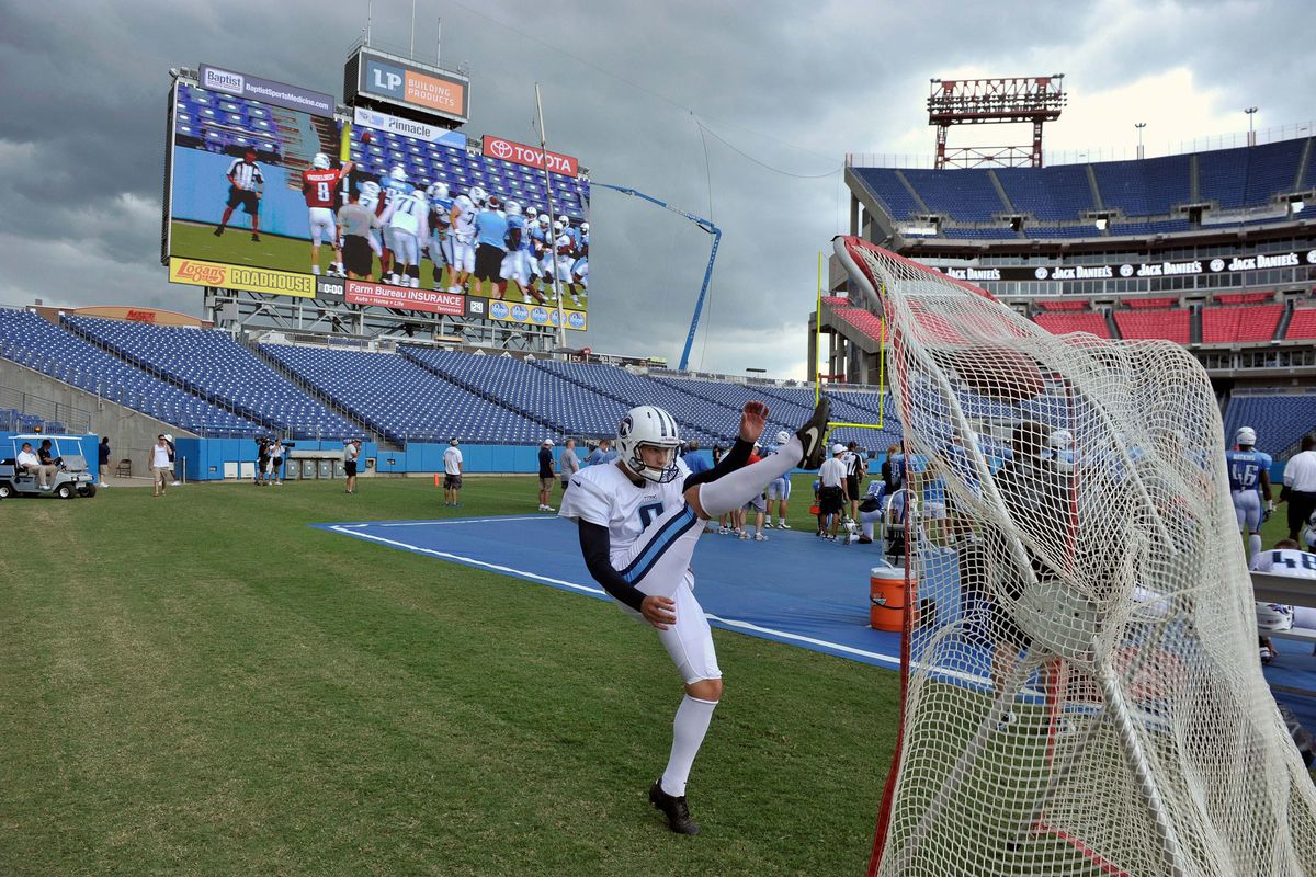 Aug 4, 2012; Nashville, TN, USA; Tennessee Titans punter Brett Kern (6) practices his punting on the sideline as storm clouds roll in during training camp workout at LP Field. Mandatory Credit: Jim Brown-US PRESSWIRE