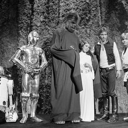 FILE - In this Nov. 13, 1978 file photo, shows, from left, Kenny Baker, Anthony Daniels, Peter Mayhew, Carrie Fisher, Harrison Ford, and Mark Hamill during the filming of the CBS-TV special "The Star Wars Holiday" in Los Angeles. On Tuesday, Dec. 27, 2016, a publicist says Fisher has died at the age of 60. 