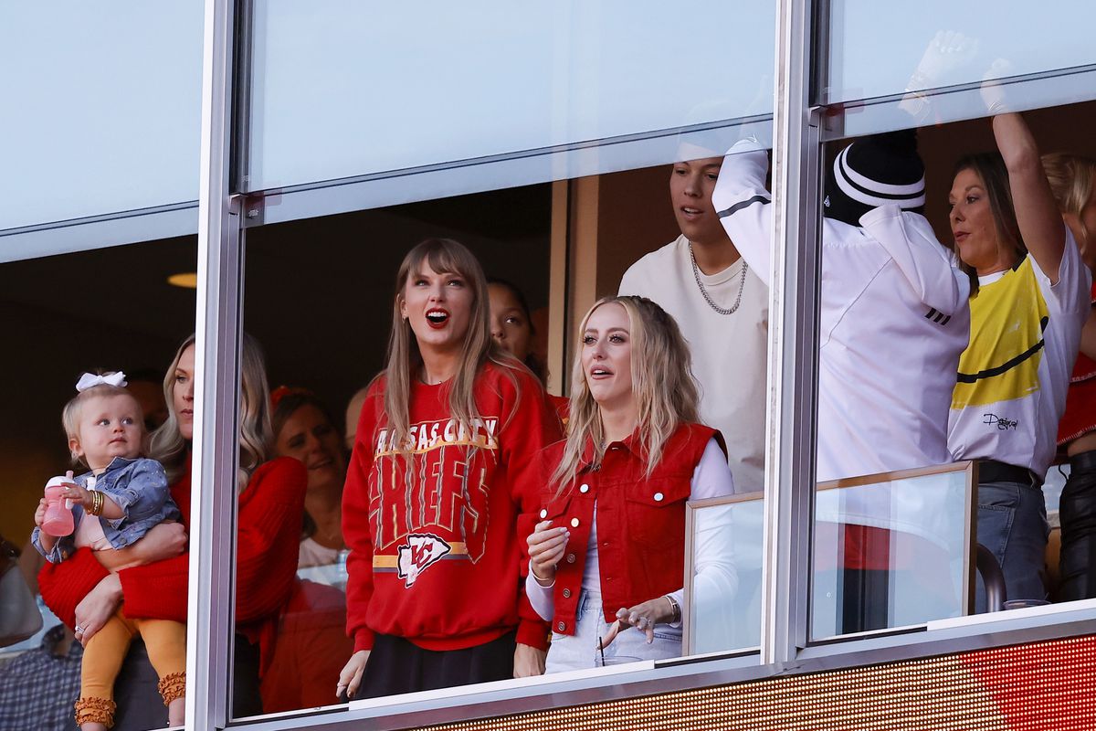 Taylor Swift and Brittany Mahomes react to a touchdown scored by Travis Kelce of the Kansas City Chiefs during the second quarter of the game against the Los Angeles Chargers in October.