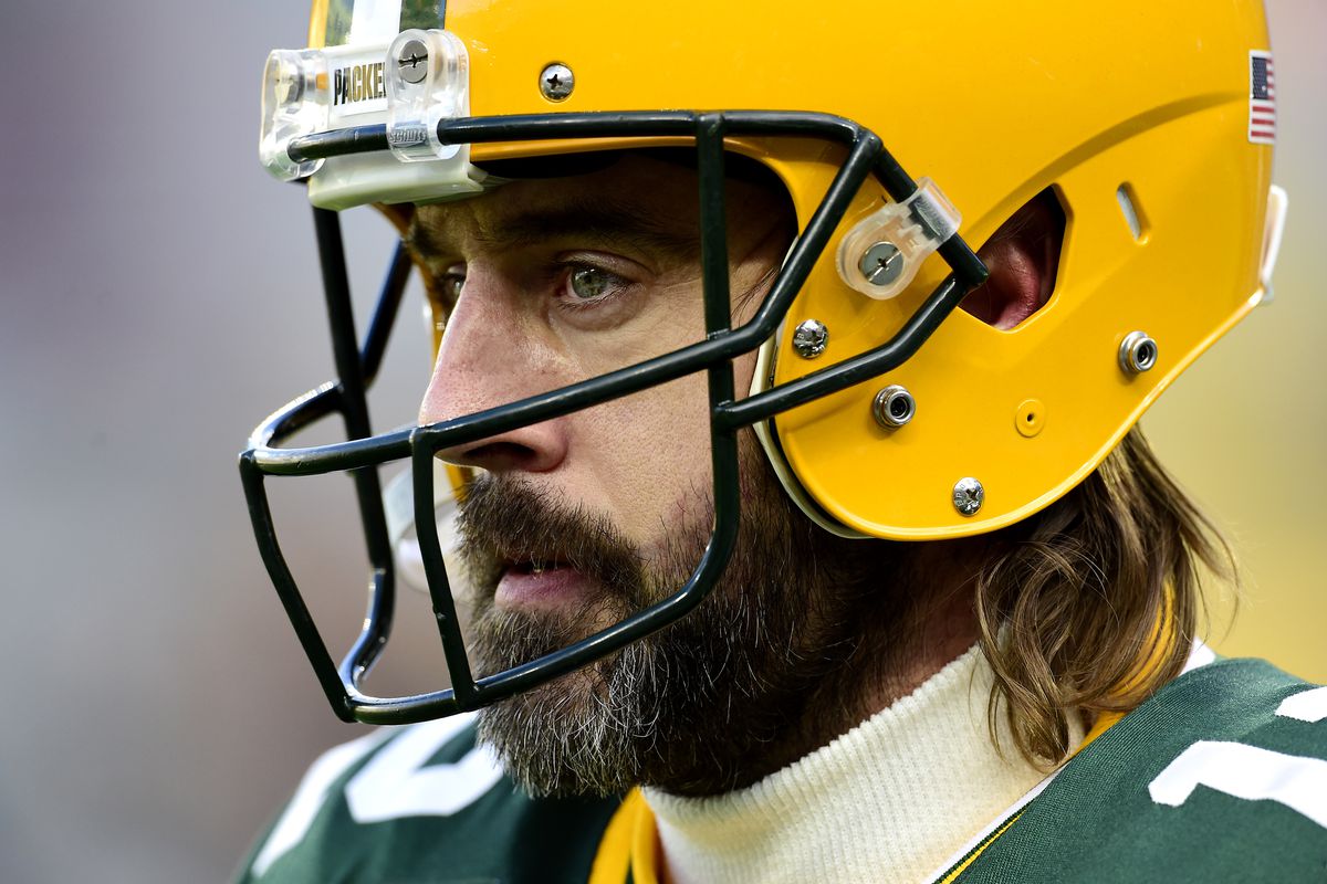 Aaron Rodgers #12 of the Green Bay Packers on the field during pregame warm-ups before the game against the Los Angeles Rams at Lambeau Field on November 28, 2021 in Green Bay, Wisconsin.