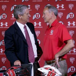 FILE - University of Utah director of athletics Chris Hill and University of Utah club lacrosse head coach Brian Holman speak after a press conference where an announcement was made that the university will begin sponsoring men's lacrosse as an NCAA sport starting in 2018-19 at the university in Salt Lake City on Friday, June 16, 2017.