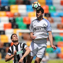 Kevin Lasagna of Udinese Calcio battles for the ball with Andrea Ranocchia of FC Internazionale during the Serie A match between Udinese Calcio and FC Internazionale at Stadio Friuli on May 6, 2018 in Udine, Italy.