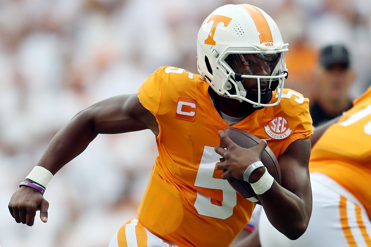 Hendon Hooker of the Tennessee Volunteers runs with the ball against the Florida Gators at Neyland Stadium on September 24, 2022 in Knoxville, Tennessee. Tennessee won the game 38-33.