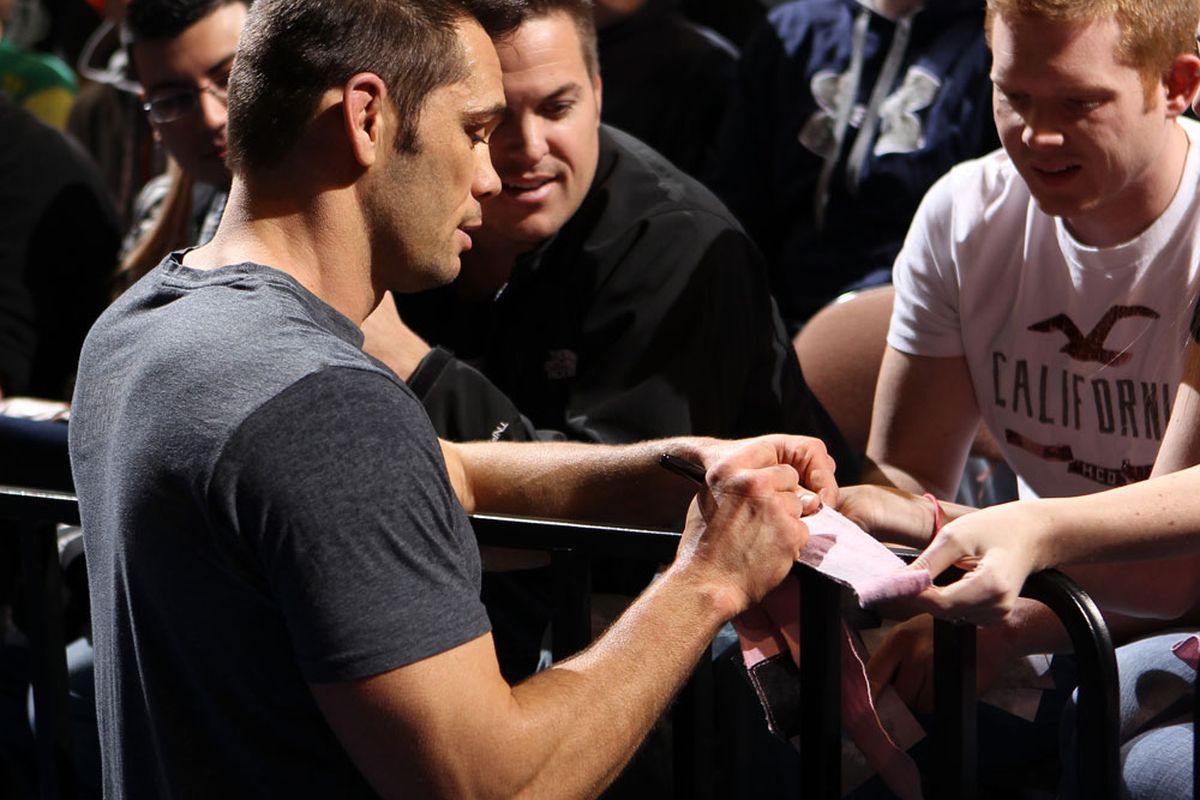 Rich Franklin signs autographs for fans - Photo by Josh Hedges/Zuffa LLC via Getty Images