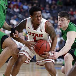 Utah Utes guard Justin Bibbins is defended by Oregon Ducks forward Paul White and Oregon Ducks guard Payton Pritchard during the Pac-12 basketball tournament in Las Vegas on Thursday, March 8, 2018.