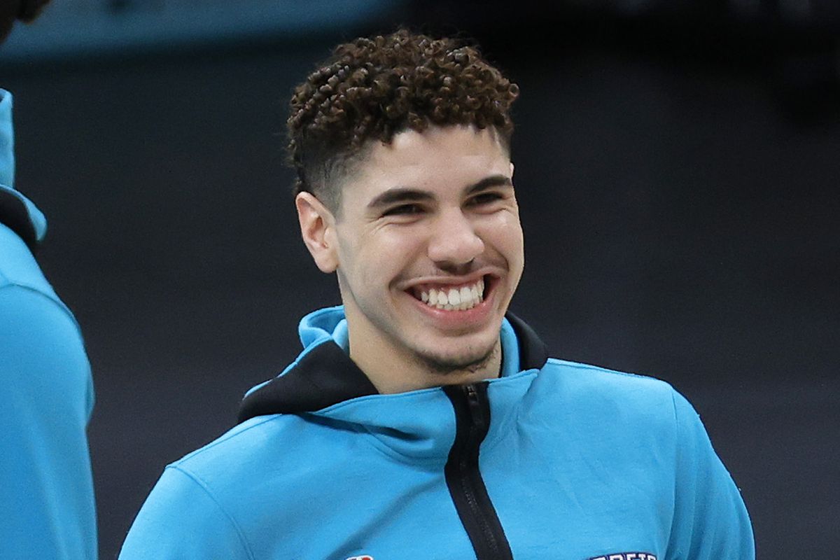 LaMelo Ball of the Charlotte Hornets shares a smile prior to their game against the Atlanta Hawks at Spectrum Center on January 09, 2021 in Charlotte, North Carolina.