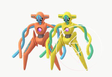 Shiny Deoxys with its normal form. Shiny Deoxys is yellow and green instead of orange and blue.