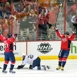 Alzner and Ovechkin Celebrate with Cole in the Middle