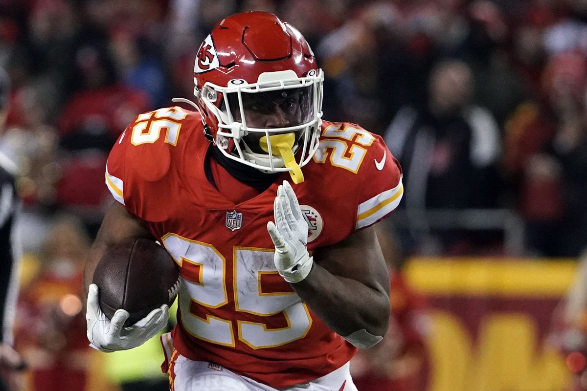 Kansas City Chiefs running back Clyde Edwards-Helaire (25) carries the ball against the Buffalo Bills during the third quarter in the AFC Divisional playoff football game at GEHA Field at Arrowhead Stadium.